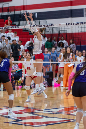 No. 4 Hannah Deatherage jumps for a block. Photos courtesy Joy Deatherage