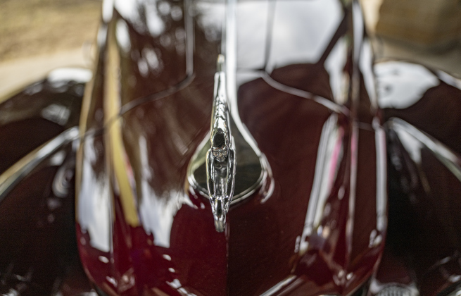 The hood and hood ornament of a 1940 Packard Darrin shines during the 12th  Annual Main Street Car Show held in downtown Taylor on Saturday, October 25, 2025.   Photo by Andy Sharp.