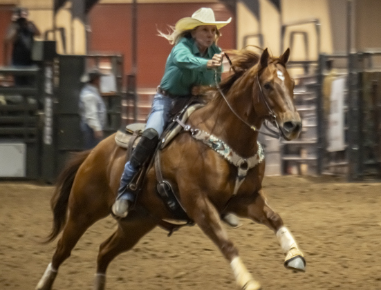 Riley Isbell of Salado, Texas competes in Barrel Racing during the Williamson County Rodeo  on Thursday, October 23, 2025.  The three-night rodeo is held along with the Williamson County Fair at the Williamson County Expo Center.   Photo by Andy Sharp.