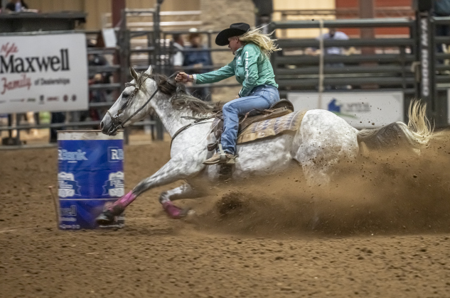 Tammy Fischer of Ledbetter, Texas competes in Barrel Racing during the Williamson County Rodeo  on Thursday, October 23, 2025.  The three-night rodeo is held along with the Williamson County Fair at the Williamson County Expo Center.   Photo by Andy Sharp.