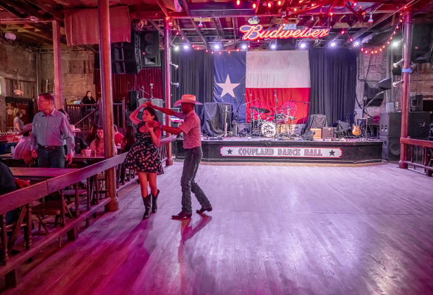 Gilbert Garza enjoys a dance with Renee (she preferred not to give a full name) at the Coupland Dance Hall on Saturday, August 30, 2025.    Photo by Andy Sharp.