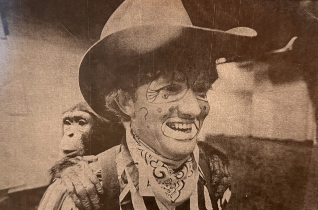 A young Larry Clayman, wearing his clown makeup, carries a young Todo on his back.