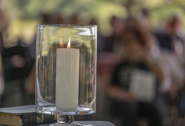 Candles give off a warm glow during  a Blessing of the Animals service conducted by Grace Episcopal Church, held at Booty’s Road Park on Sunday, October 5, 2025.  Lunch was provided at the park’s pavilion after the service acknowledging the work of Saint Francis of Assisi.   Photo by Andy Sharp.