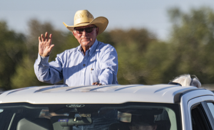 Larry Clayman acknowledges the crowd as he rides through the arena  at the 32nd Annual Clayman  Rodeo held at Windsong Farm on Saturday, October 4, 2025.