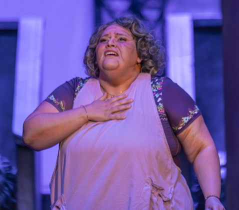 Gina Marie, as Abuela Claudia is pictured in a scene from the Thursday, October 2, 2025 dress rehearsal for “In the Heights,” playing on the Palace Springer Stage through November 2nd.  Photo by Andy Sharp.