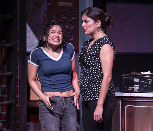 Isabella Monette, left, as Nina, and Veronica DeSantos Ryan, playing Camila, are pictured in a scene from the Thursday, October 2, 2025 dress rehearsal for “In the Heights,” playing on the Palace Springer Stage through November 2nd.  Photo by Andy Sharp.