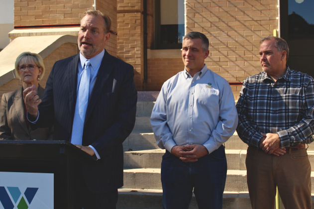 County Judge Steve Snell, center, announces the plan for the Williamson County Water Study, November 25. Photo by Nalani Nuylan.