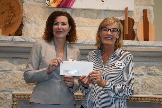Yesterday’s Gone Founder and Director LoreeTamayo stands with Judy Madsen, WHO vice president. 