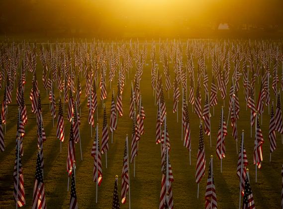 The sun begins to set over a field of American flags at the Georgetown Field of Honor in San Gabriel Park  on Saturday evening, November 8, 2025.