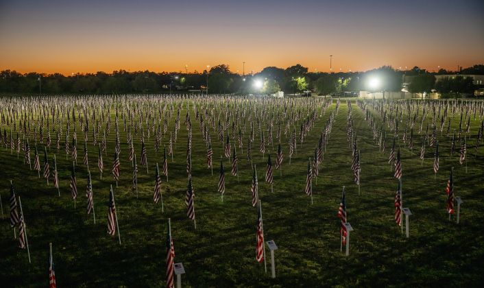 An expansive field of American flags are seen well past sunset at the Georgetown Field of Honor in San Gabriel Park  on Saturday evening, November 8, 2025.
