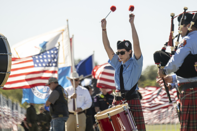 Members of the Georgetown Fire Department’s Pipes and Drums participate in the Parade of Colors at the Georgetown Field of Honor on Sunday, November 9, 2025. 