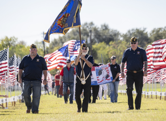 John McCleskey, center, Commander at VFW Post 8587, joined his fellow veterans during the Parade of Colors  at the Georgetown Field of Honor on Sunday, November 9, 2025.