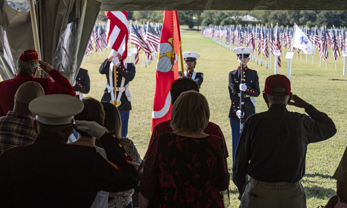 Cadets from the Round Rock High School Marine Corps Junior R.O.T.C. program post colors during a ceremony to honor the 250th birthday of the United States Marine Corps  at the Georgetown Field of Honor in San Gabriel Park  on Saturday, November 8, 2025.
