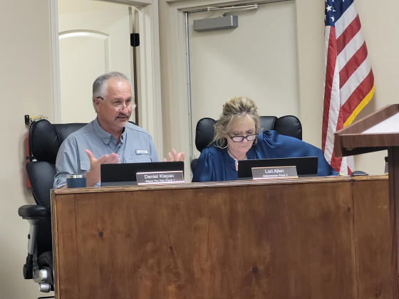 Mayor Pro Tem/Alderman Place 1 Daniel Klepac, left, and Alderwoman Place 2 Lori Allen, right, ask questions on construction specifics during the November 4 Jarrell City Council meeting. Photo by Nalani Nuylan.