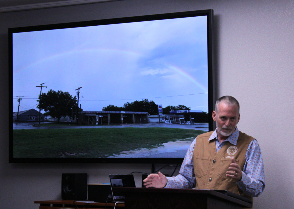 Florence Mayor Ben Daniel uses a photo of a rainbow over the city to describe where the city is going in the future. Photo by Nalani Nuylan.