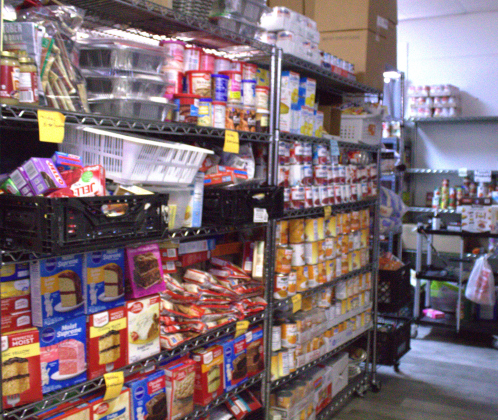 The Hutto Resource Center food pantry is stocked with nonperishable goods. Photo by Nalani Nuylan.
