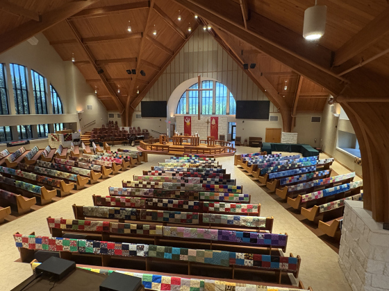 Handmade quilts are draped over the benches at Faith Lutheran Church in Georgetown. 