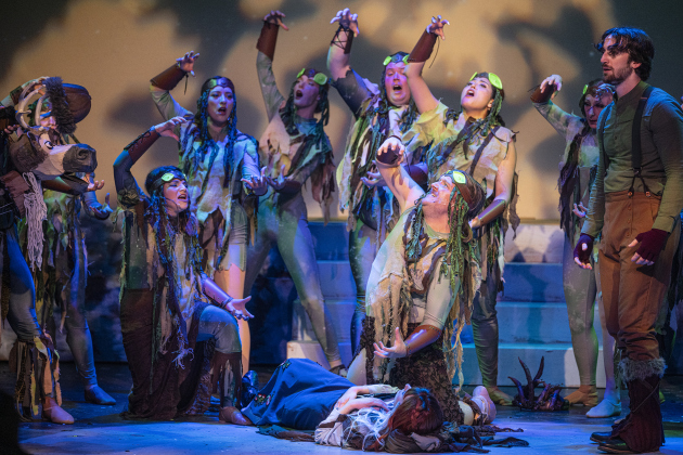 Cast members, including Nathan Clemenson (center, kneeling), a Pabbie, and Jon Bristol, right, as Kristoff, are shown  in a scene from the Thursday, November 20, 2025 dress rehearsal of “Frozen,” playing through February 1, 2026 on the Springer Stage. Photo by Andy Sharp.