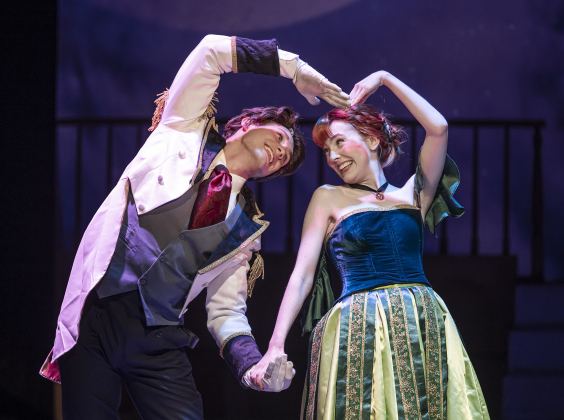 Jake Jordan, as Hans, and Lauren MacLeod, as Anna,  are pictured in a scene from the Thursday, November 20, 2025 dress rehearsal of “Frozen,” playing through February 1, 2026 on the Springer Stage. Photo by Andy Sharp.