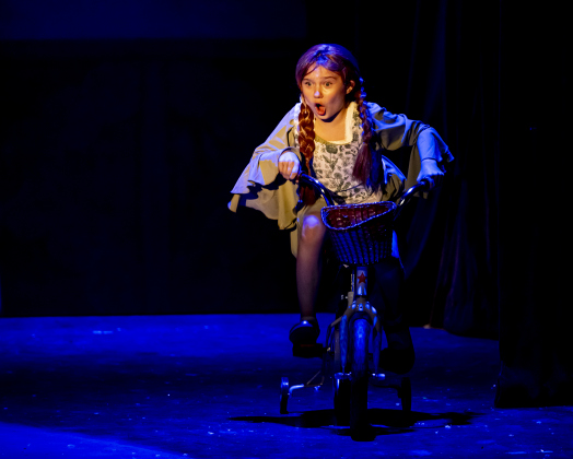 Ella Schnneekloth, as Young Anna,  is pictured in a scene from the Thursday, November 20, 2025 dress rehearsal of “Frozen,” playing through February 1, 2026 on the Springer Stage. Photo by Andy Sharp.