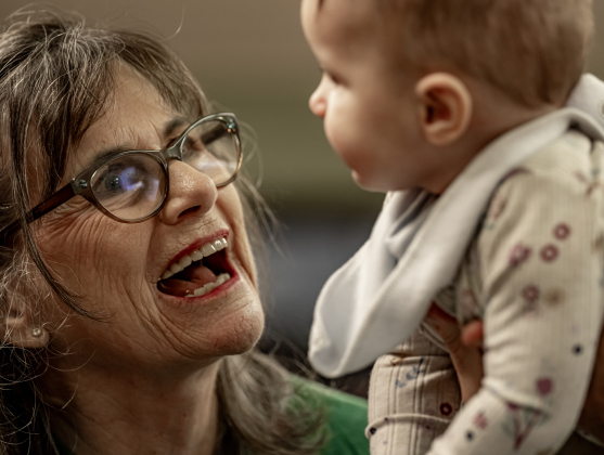 Church member Nancy Bottinger enjoys spending time with her almost 7-month-old granddaughter Alice Wasson while they attended the 22nd Annual  Come Home for Christmas Celebration held at St. John’s Methodist Church on Saturday, November 22, 2025.  The event included a Youth Cafe, with proceeds going to the St. John’s Youth Ministry.  There was also a silent auction, crafts made by church members, plus a bake sale.   Photo by Andy Sharp. 