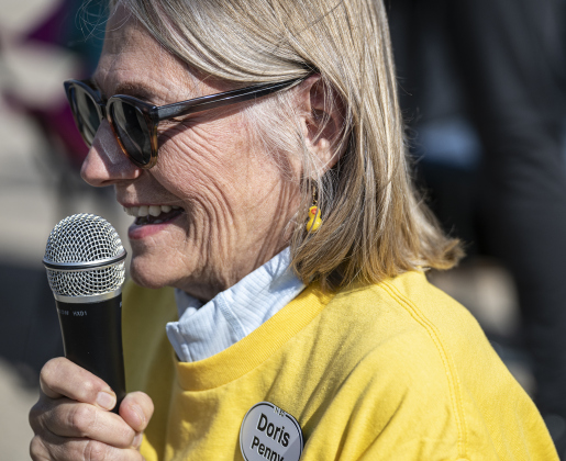 American Association of University Women  Doris Penny oversees the action during the 10th Annual AAUW Duck Race held on the river at San Gabriel Park on Saturday, November 1, 2025.  Rubber ducks are placed in the river and race to the finish in several heats.  Winners of winning ducks win prizes.   The event raises funds for area high school student scholarships. Photo by Andy Sharp.
