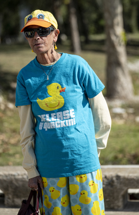 American Association of University Women member  Karen Sherman was fully-attired in duck clothing for  the 10th Annual AAUW Duck Race held on the river at San Gabriel Park on Saturday, November 1, 2025.  Rubber ducks are placed in the river and race to the finish in several heats.  Winners of winning ducks win prizes.   The event raises funds for area high school student scholarships. Photo by Andy Sharp.