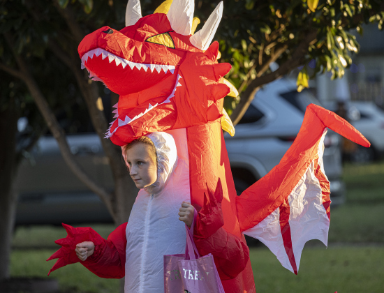 9-year-old Kato Cooper was dressed as a dragon for Halloween along Main Street on Friday, October 31, 2025.  Photo by Andy Sharp.