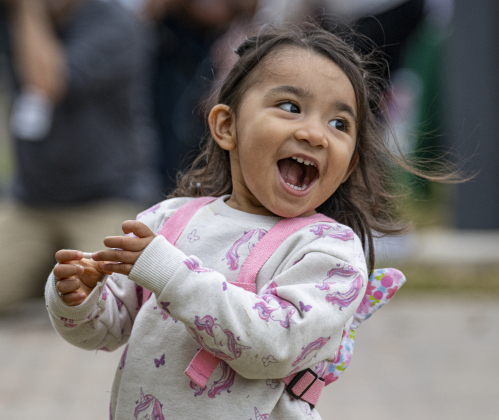 3-year-old Freyja Ibanez was enthralled to be attending  Georgetown’s Dia de los Muertos,  held Saturday November 1, 2025  in the South Main Arts District along 9th Street.  The event included music and dance performances throughout the day.   Photo by Andy Sharp.
