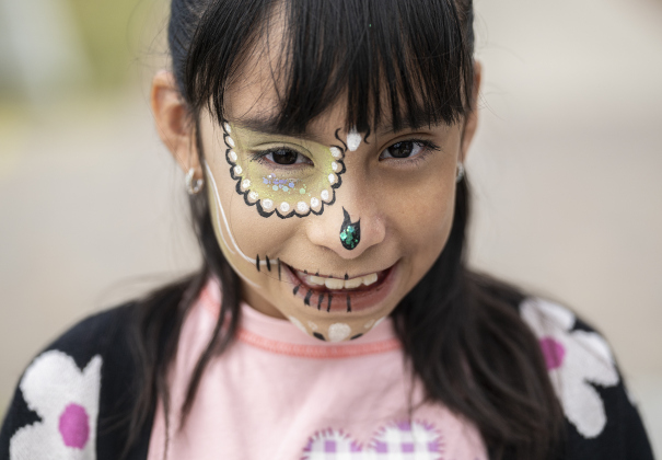 10-year-old Sofia Ramirez, a member of the Georgetown ISD Ballet Folkloric and a student at Purl Elementary, wore a nice smile with her painted face during Georgetown’s Dia de los Muertos,  held Saturday November 1, 2025  in the South Main Arts District along 9th Street.  The event included music and dance performances throughout the day.   Photo by Andy Sharp.