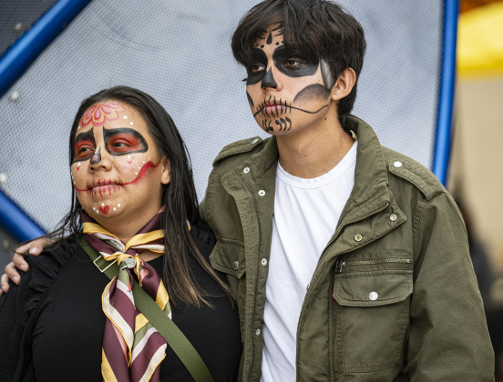 Juana Rodriguez and her son Cesar, 17, enjoyed their time together at  Georgetown’s Dia de los Muertos,  held Saturday November 1, 2025  in the South Main Arts District along 9th Street.  Mom offered face-painting to attendees.  The event included music and dance performances throughout the day.   Photo by Andy Sharp.