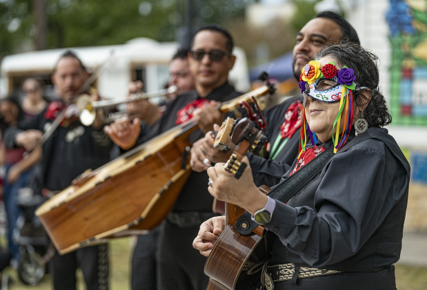 Lita Hernandez, front right, performs with Mariachi Espuelas during Georgetown’s Dia de los Muertos,  held Saturday November 1, 2025  in the South Main Arts District along 9th Street.  The event included music and dance performances throughout the day.   Photo by Andy Sharp.