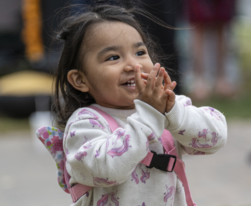 3-year-old Freyja Ibanez was enjoying the sights and sounds of  Georgetown’s Dia de los Muertos,  held Saturday November 1, 2025  in the South Main Arts District along 9th Street.  The event included music and dance performances throughout the day.   Photo by Andy Sharp.