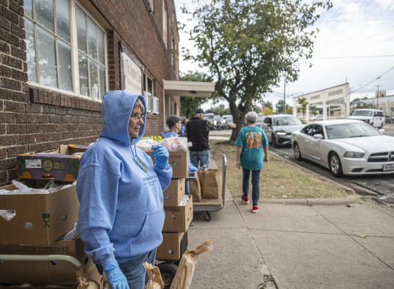  Cindy Bryan was among the volunteers from Taylor’s First United Methodist Church helping distribute food at Shepherd’s Heart Food Pantry in downtown Taylor on Saturday morning, November 1, 2025. 