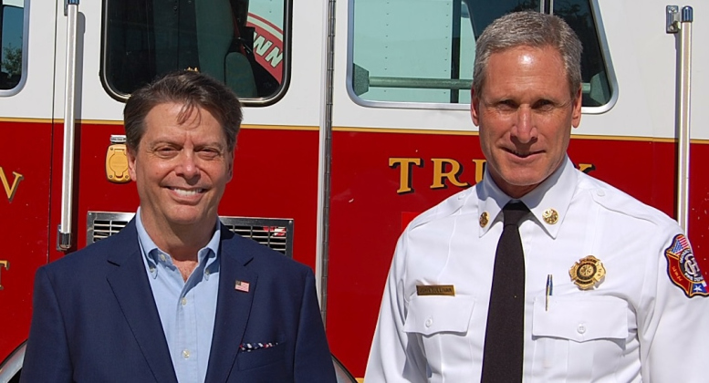 ESD 8 Commissioner Troy Rodriguez and Fire Chief John Sullivan stand in front of a fire engine. ESD 8 service residents in the City of Georgetown and its surrounding areas. (Photo by Kaitlyn Wilkes)
