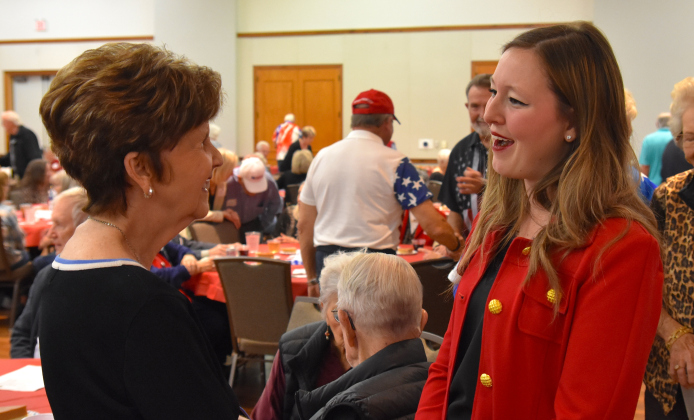 Linda McDaniel, left, speaks with state Representative Caroline Harris Davila before the start of the event. County Commissioner Valerie Covey, County Judge Steve Snell and state Senator Terry Wilson were other elected officials in attendance. (Photo by Kaitlyn Wilkes)