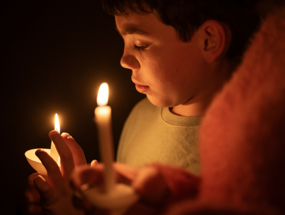Andrew Lake, 9, attends   the Southwestern Candlelight Service, The Service of Lessons and Carols, held at Southwestern’s Lois Perkins Chapel on Thursday, December 4, 2025.
