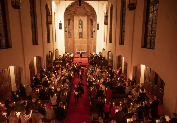 The chapel is darkened as candles are lighted during  the Southwestern Candlelight Service, The Service of Lessons and Carols, held at Southwestern’s Lois Perkins Chapel on Thursday, December 4, 2025.