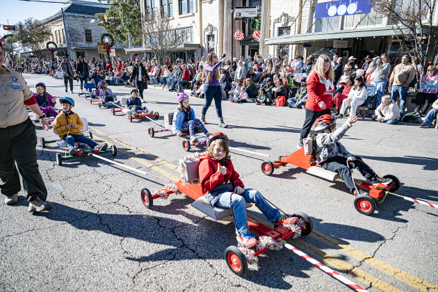 Members of Georgetown’s Cub Scout Pack 405 participated in  the parade along Austin Avenue during the annual Christmas Stroll, held in downtown Georgetown on Saturday, December 6, 2025.   Photo by Andy Sharp.