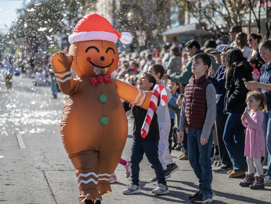 There was a lot of festive artificial snow to add  to the parade along Austin Avenue during the annual Christmas Stroll, held in downtown Georgetown on Saturday, December 6, 2025.   Photo by Andy Sharp.