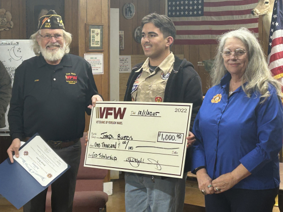 Georgetown High School sophomore Joseph Bustos accepts his $1,000 scholarship prize from Veterans of Foreign Wars Post 8587 Commander John McLeskey and Victoria Wren, from the Post’s Auxiliary. Joseph’s recorded essay in the VFW’s Voice of Democracy competition was selected over 20 other entries and went on to win second-place at the five-county district level.