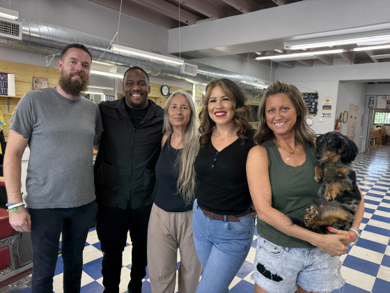 (Staff from left to right) Jared Shotwell, Ronald Brakes, Esin Lau, Mandy Guerra and Savannah Stampley with her dog Sebastian. He is the shop dog and enjoys plenty of treats. 