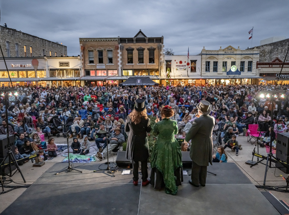The Uptown Carolers perform during the Lighting of the Square on Friday, November 28, 2025.  Photo by Andy Sharp.