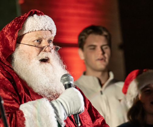 Santa Claus appears as the lights prepare to come on during  the Lighting of the Square on Friday, November 28, 2025.  Photo by Andy Sharp.