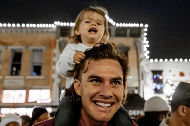 Chris Walkerow and his daughter Penelope, 2, had fun together during the Lighting of the Square on Friday, November 28, 2025.   Photo by Andy Sharp.