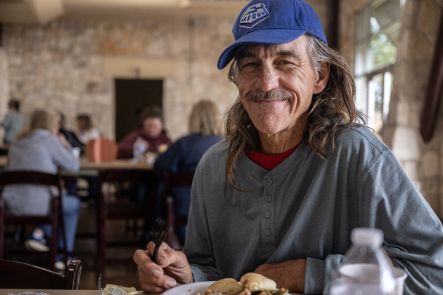 John Adams, who is homeless, enjoyed his meal during  the Georgetown Community Thanksgiving, held at the San Gabriel Community Center on Thursday, November 27, 2025.