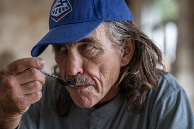 John Adams, who is homeless, enjoyed his meal during  the Georgetown Community Thanksgiving, held at the San Gabriel Community Center on Thursday, November 27, 2025.