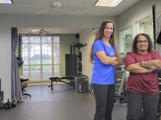 Exercise physiologists Mira Rasmussen, left, and Abri Morrision standing in Fitness Beyond Training at 3008 Dawn Drive, Suite 205, Georgetown. Ms. Morrison offers massage in conjunction with her training.