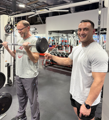 Morgan Mclaughin, left, works out with trainer Brennan Eggers at Georgetown Fitness. 