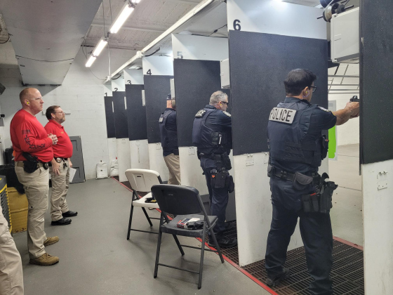Florence Police Chief Wayne Thompson (in the red long sleeve shirt) observes his officers as they complete their Texas Commission on Law Enforcement firearms qualification on January 5 in Killeen. Photo by Nalani Nuylan. 